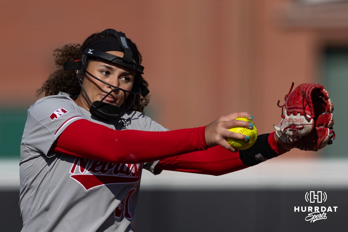 Nebraska Cornhusker Kylee Magee (31) throws a pitch against the Purdue Boilermakers in the fourth inning with a special message stitched in her glove during a college softball game Monday, March 31, 2025 in Lincoln, Nebraska. Photo by John S. Peterson.