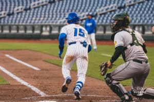 Creighton Bluejay Kyle Hess off to first base after a hit during a baseball game at Charles Schwab Field on April 8th, 2025 in Omaha Nebraska. Photo by Collin Stilen.