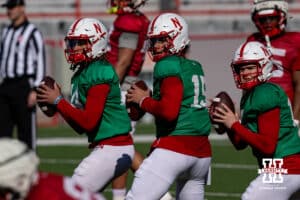 Nebraska Cornhusker quarterbacks TJ Lateef, Dylan Railola, and Marcos Davila dropback to pass during practice Tuesday, April 8, 2025 in Lincoln, Nebraska. Photo by John S. Peterson.