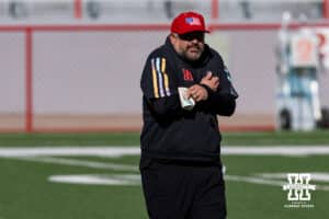 Nebraska Cornhusker Matt Rhule signaling that is it a little chilly during practice Tuesday, April 8, 2025 in Lincoln, Nebraska. Photo by John S. Peterson.