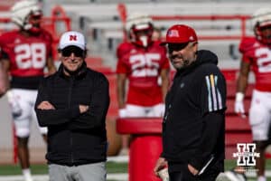 Nebraska Cornhusker coaches Dana Holgorsen and Matt Rhule talking during practice Tuesday, April 8, 2025 in Lincoln, Nebraska. Photo by John S. Peterson.