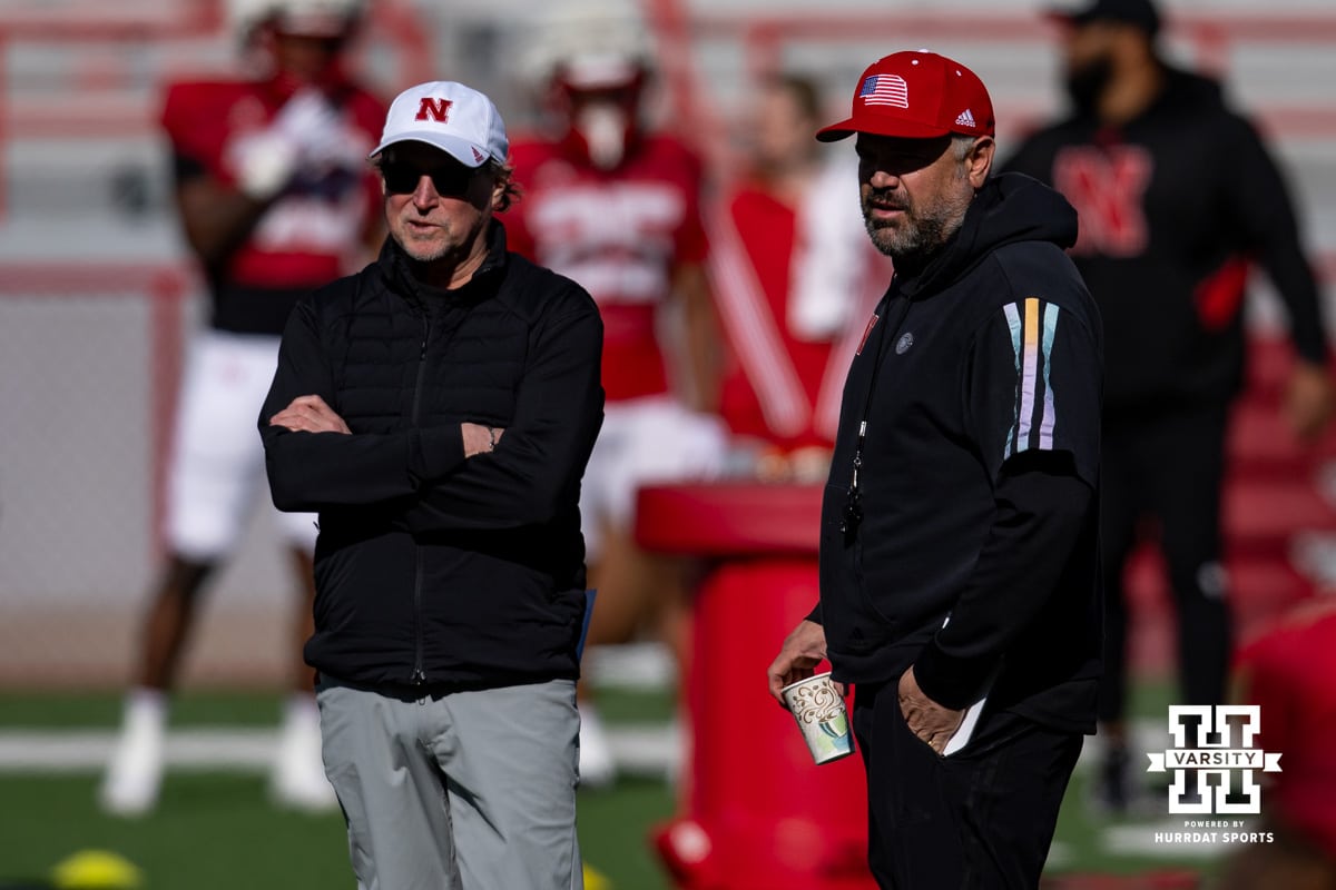 Nebraska Cornhusker coaches Dana Holgorsen and Matt Rhule talking during practice Tuesday, April 8, 2025 in Lincoln, Nebraska. Photo by John S. Peterson.