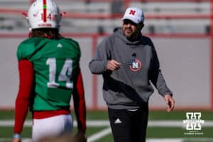 Nebraska Cornhusker quarterbacks coach Glenn Thomas talks to TJ Lateef (14) during practice Tuesday, April 8, 2025 in Lincoln, Nebraska. Photo by John S. Peterson.