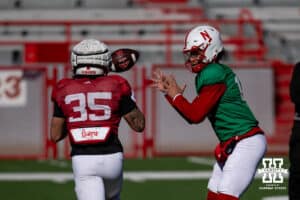 Nebraska Cornhusker Dylan Raiola (15) tosses the ball to Mekhi Nelson (35) during practice Tuesday, April 8, 2025 in Lincoln, Nebraska. Photo by John S. Peterson.