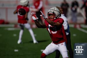 Nebraska Cornhusker Nuyziah Hunter (13) makes a catch during practice Tuesday, April 8, 2025 in Lincoln, Nebraska. Photo by John S. Peterson.