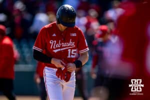 Nebraska Cornhusker infielder Dylan Carey (15) heads to the dugout after being left on base at the end of the ninth after Rutgers Scarlet Knights takes the win during a college baseball game Sunday, April 6, 2025 in Lincoln, Nebraska. Photo by John S. Peterson.