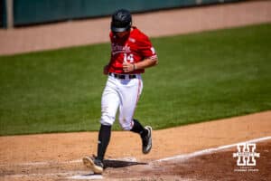 Nebraska Cornhusker utility Case Sanderson (14) scores in the seventh against the Rutgers Scarlet Knights during a college baseball game Sunday, April 6, 2025 in Lincoln, Nebraska. Photo by John S. Peterson.