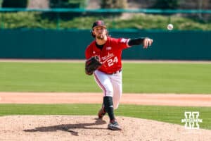 Nebraska Cornhusker pitcher Caleb Clark (24) throws a pitch against the Rutgers Scarlet Knights during a college baseball game Sunday, April 6, 2025 in Lincoln, Nebraska. Photo by Jansen Coburn.