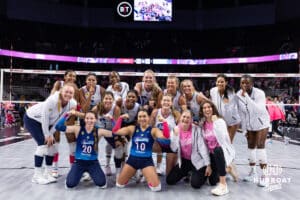 Omaha Supernovas gather up for a group photo after the in the win over the Orlando Valkyries during a professional volleyball match Saturday, April 5, 2025 in Omaha, Nebraska. Photo by John S. Peterson.