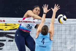 Omaha Supernovas Kayla Caffey (28) spikes the ball against Orlando Valkyrie Courtney Schwan (4) during a professional volleyball match Saturday, April 5, 2025 in Omaha, Nebraska. Photo by John S. Peterson.