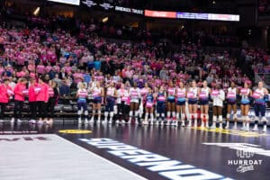Omaha Supernovas holding up signs saying who the stand up for in the fight against cancer at the break after the first set during a professional volleyball match against the Orlando Valkyries Saturday, April 5, 2025 in Omaha, Nebraska. Photo by John S. Peterson.