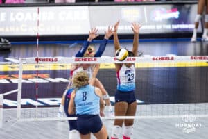 Omaha Supernovas Emily Londot (27) and Omaha Supernovas Kaitlyn Hord (23) block a spike against the Orlando Valkyries in the first set during a professional volleyball match Saturday, April 5, 2025 in Omaha, Nebraska. Photo by John S. Peterson.