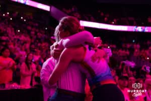 Omaha Supernovas Lindsay Krause (22) hugs her mom after giving her the mini volleyball on Pink Out Night before taking on the Orlando Valkyries during a professional volleyball match Saturday, April 5, 2025 in Omaha, Nebraska. Photo by John S. Peterson.