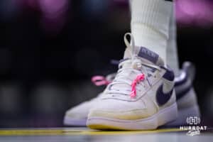 Omaha Supernovas Toyosi Onabanjo (21) tied pink ribbons on her shoes on Pink Out Night against the Orlando Valkyries during a professional volleyball match Saturday, April 5, 2025 in Omaha, Nebraska. Photo by John S. Peterson.