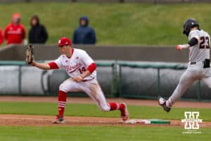 Nebraska Cornhusker utility Case Sanderson (14) makes the out against Oregon State Beaver Canon Reeder (23) in the fourth during a college baseball game Saturday, March 29, 2025 in Lincoln, Nebraska. Photo by John S. Peterson.