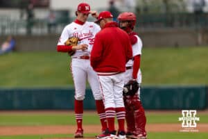 Nebraska Cornhusker pitcher Carson Jasa (39) in to pitch against the Oregon State Beavers as coach Rob Childress talks to him before the start of the fourth inning during a college baseball game Saturday, March 29, 2025 in Lincoln, Nebraska. Photo by John S. Peterson.