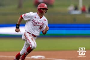 Nebraska Cornhusker Case Sanderson (14) runs home to score against the Oregon State Beavers in the third inning during a college baseball game Saturday, March 29, 2025 in Lincoln, Nebraska. Photo by John S. Peterson.