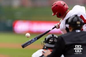 Nebraska Cornhusker utility Case Sanderson (14) hits a single in the third inning against the Oregon State Beavers during a college baseball game Saturday, March 29, 2025 in Lincoln, Nebraska. Photo by John S. Peterson.