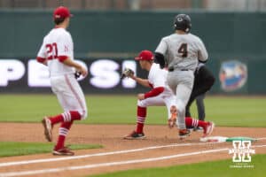 Nebraska Cornhusker utility Case Sanderson (14) makes the out against Oregon State Beaver infielder Dallas Macias (4) in the second inning during a college baseball game Saturday, March 29, 2025 in Lincoln, Nebraska. Photo by John S. Peterson.