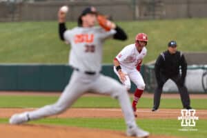 Nebraska Cornhusker utility Case Sanderson (14) leads off of first as Oregon State Beaver pitcher Dax Whitney (30) throws a pitch in the first inning during a college baseball game Saturday, March 29, 2025 in Lincoln, Nebraska. Photo by John S. Peterson.
