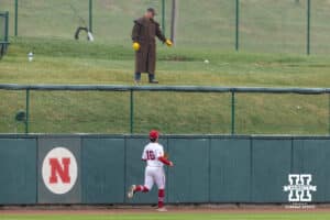 Nebraska Cornhusker Devin Nunez (16) watches the ball go over the wall for a home run byOregon State Beaver infielder Aiva Arquette (13) in the first during a college baseball game Saturday, March 29, 2025 in Lincoln, Nebraska. Photo by John S. Peterson.