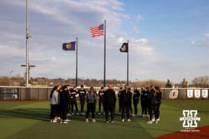 Omaha Mavericks huddles up after the loss to the Nebraska Cornhuskers during a college softball game on Wednesday, March 26, 2025, in Omaha, Nebraska. Photo by John S. Peterson.