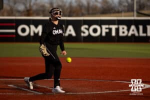 Omaha Maverick pitcher Grace Hornbuckle (7) throws a pitch against the Nebraska Cornhuskers during a college softball game on Wednesday, March 26, 2025, in Omaha, Nebraska. Photo by John S. Peterson.