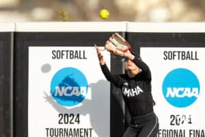 Omaha Maverick outfielder Marra Cramer (9) makes a catch for a out against the Nebraska Cornhuskers during a college softball game on Wednesday, March 26, 2025, in Omaha, Nebraska. Photo by John S. Peterson.