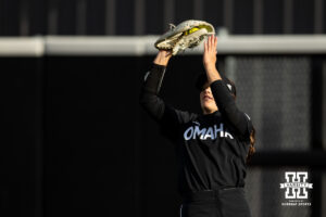 Omaha Mavericks Sammy Schmidt makes a catch for an out against the Nebraska Cornhuskers during a college softball game on Wednesday, March 26, 2025, in Omaha, Nebraska. Photo by John S. Peterson.