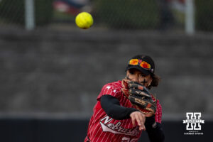 Nebraska Cornhusker Samantha Bland (29) throws to first for an out against the Omaha Mavericks during a college softball game on Wednesday, March 26, 2025, in Omaha, Nebraska. Photo by John S. Peterson.