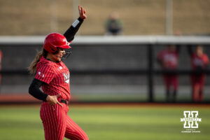 Nebraska Cornhusker Bella Bacon (3) celebrates a hitting a double against the Omaha Mavericks during a college softball game on Wednesday, March 26, 2025, in Omaha, Nebraska. Photo by John S. Peterson.