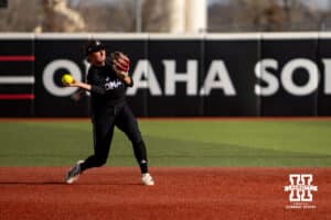 Omaha Mavericks Katherine Johnson throws to fist for an out against the Nebraska Cornhuskers in the first inning during a college softball game on Wednesday, March 26, 2025, in Omaha, Nebraska. Photo by John S. Peterson.