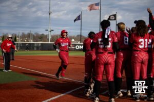 Nebraska Cornhusker Olivia DiNardo (1) runs home after hitting a grand slam in the first inning against the Omaha Mavericks during a college softball game on Wednesday, March 26, 2025, in Omaha, Nebraska. Photo by John S. Peterson.