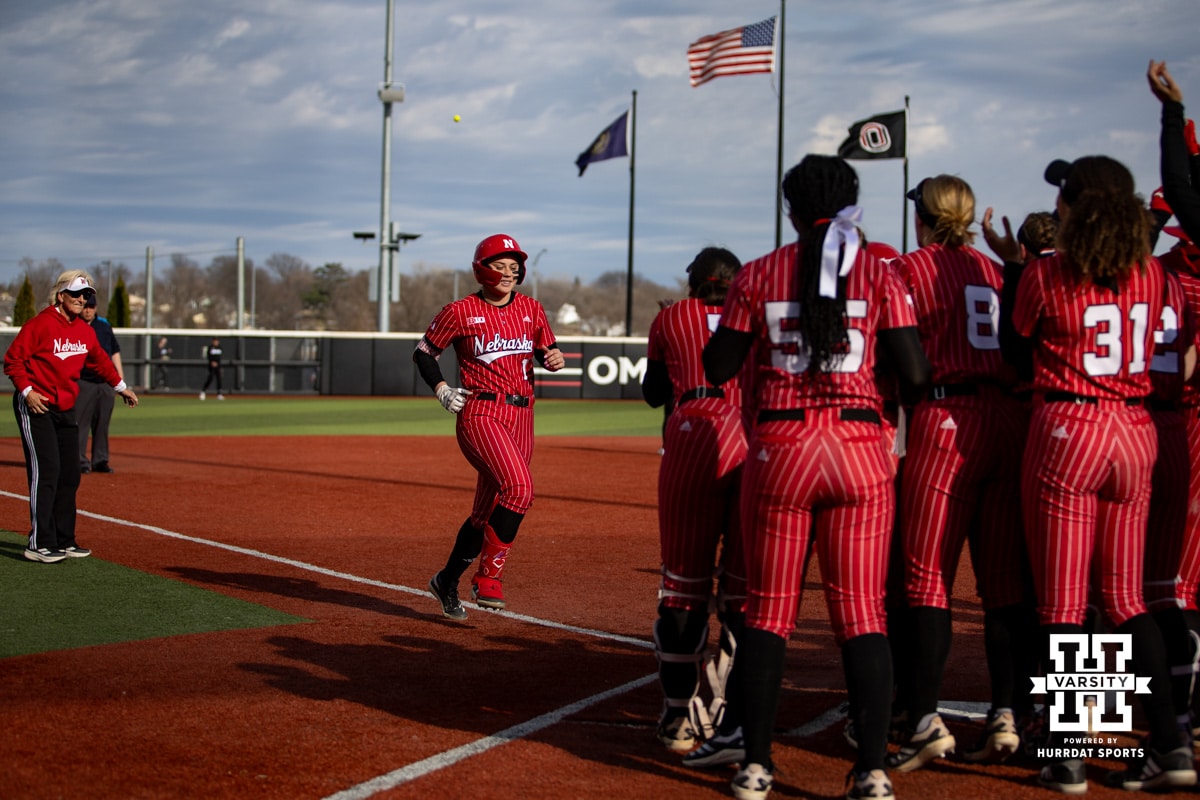 Nebraska Cornhusker Olivia DiNardo (1) runs home after hitting a grand slam in the first inning against the Omaha Mavericks during a college softball game on Wednesday, March 26, 2025, in Omaha, Nebraska. Photo by John S. Peterson.