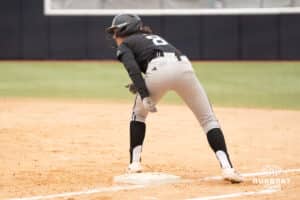Omaha Mavericks Haley Wilwerding looks to steal during a college softball game against Creighton on April 1st, 2025 in Omaha, Nebraska. Photo by Brandon Tiedemann.