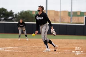 Omaha Mavericks Alexis Wiggins pitches during a college softball game against Creighton on April 1st, 2025 in Omaha, Nebraska. Photo by Brandon Tiedemann.
