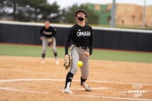 Omaha Mavericks Maddia Groff pitches during a college softball game against Creighton on April 1st, 2025 in Omaha, Nebraska. Photo by Brandon Tiedemann.