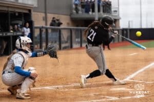 Omaha Mavericks Rylin Groff hits the ball during a college softball game against Creighton on April 1st, 2025 in Omaha, Nebraska. Photo by Brandon Tiedemann.
