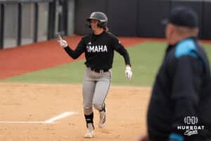 Omaha Mavericks Katherine Johnson celebrates a home run during a college softball game against Creighton on April 1st, 2025 in Omaha, Nebraska. Photo by Brandon Tiedemann.