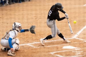 Omaha Mavericks Haley Wilwerding hits the ball during a college softball game against Creighton on April 1st, 2025 in Omaha, Nebraska. Photo by Brandon Tiedemann.