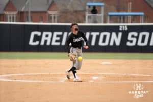 Omaha Mavericks Maddia Groff warms up during a college softball game against Creighton on April 1st, 2025 in Omaha, Nebraska. Photo by Brandon Tiedemann.