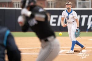 Creighton Bluejays Kenzie Schopfer pitches during a softball game against Omaha on April 1st, 2025 in Omaha Nebraska. Photo by Brandon Tiedemann.