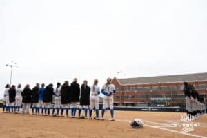 Creighton Bluejays during the national anthem during a softball game against Omaha on April 1st, 2025 in Omaha Nebraska. Photo by Brandon Tiedemann.
