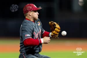 Nebraska Cornhusker infielder Josh Overbeek (4) misses grabbing the ball from his glove in the during a college baseball game Wednesday, April 2, 2025 in Omaha, Nebraska. Photo by John S. Peterson.