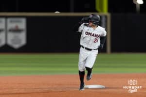 Omaha Maverick infielder Drew Borner (24) looks out to the wall where he hit his homerun against the Nebraska Cornhuskers in the seventh inning during a college baseball game Wednesday, April 2, 2025 in Omaha, Nebraska. Photo by John S. Peterson.