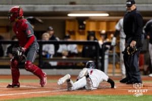 Omaha Maverick utility Henry Zipay (1) scores a run in the fifth inning against the Nebraska Cornhuskers during a college baseball game Wednesday, April 2, 2025 in Omaha, Nebraska. Photo by John S. Peterson.