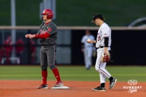 Nebraska Cornhusker utility Max Buettenback (11) steals second in the fourth against the Omaha Mavericks during a college baseball game Wednesday, April 2, 2025 in Omaha, Nebraska. Photo by John S. Peterson.