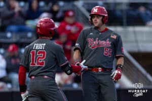 Nebraska Cornhusker Tyler Stone (55) celebrates a run with Cael Frost in the fourth against the Omaha Mavericks during a college baseball game Wednesday, April 2, 2025 in Omaha, Nebraska. Photo by John S. Peterson.