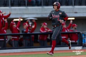 Nebraska Cornhusker infielder Josh Overbeek (4) runs in to score a run against the Omaha Mavericks in the fourth inning during a college baseball game Wednesday, April 2, 2025 in Omaha, Nebraska. Photo by John S. Peterson.