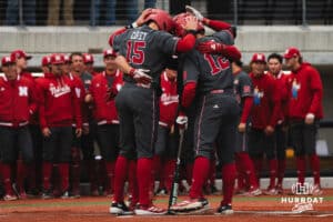 Nebraska Cornhuskers celebrate at the plate during a baseball game at Tal Anderson Field on April 2nd, 2025 in Omaha Nebraska. Photo by Collin Stilen.